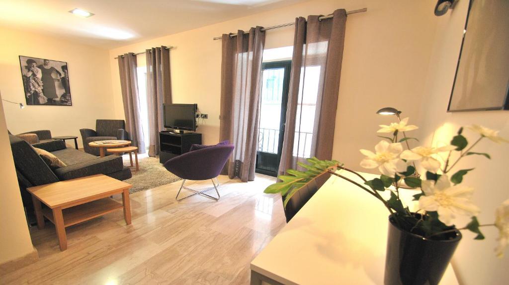 Apartamentos Living Sevilla Centro Maestranza Номер фото