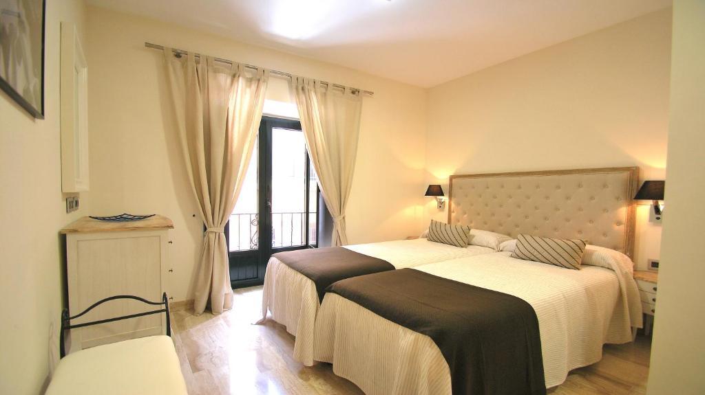 Apartamentos Living Sevilla Centro Maestranza Номер фото